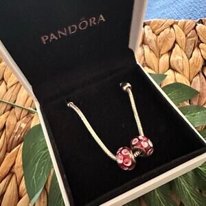 Pandora Sterling signed 925 Bracelet with two Murano sterling beads.